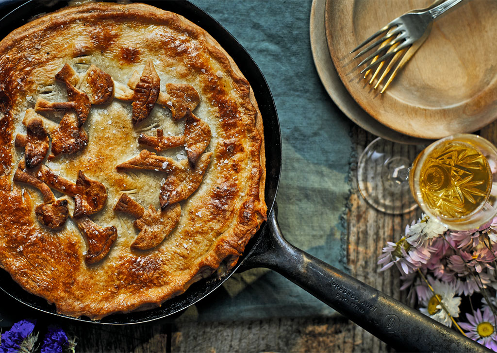 Miso Mushroom pie Miso Mushroom Pie decorated with a fairy ring of pastry mushrooms.